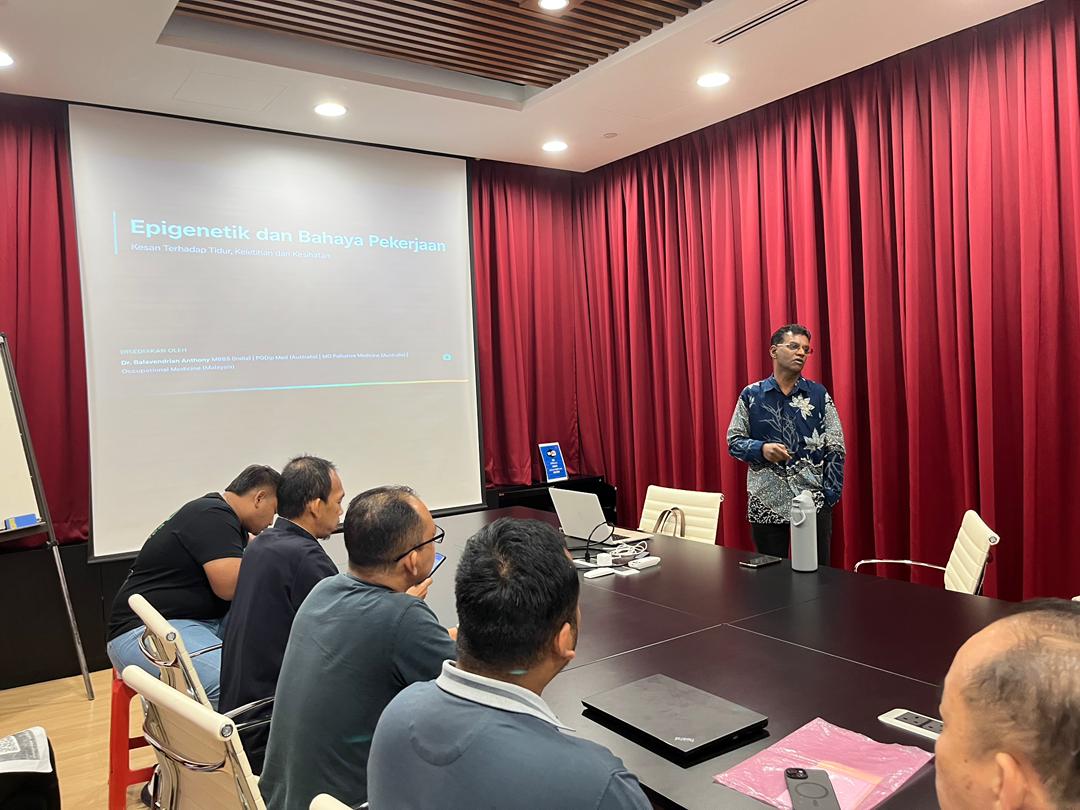 Dr. Balavendrian Anthony delivering a health talk on epigenetics and occupational hazards to employees at Globetronics in Penang.
