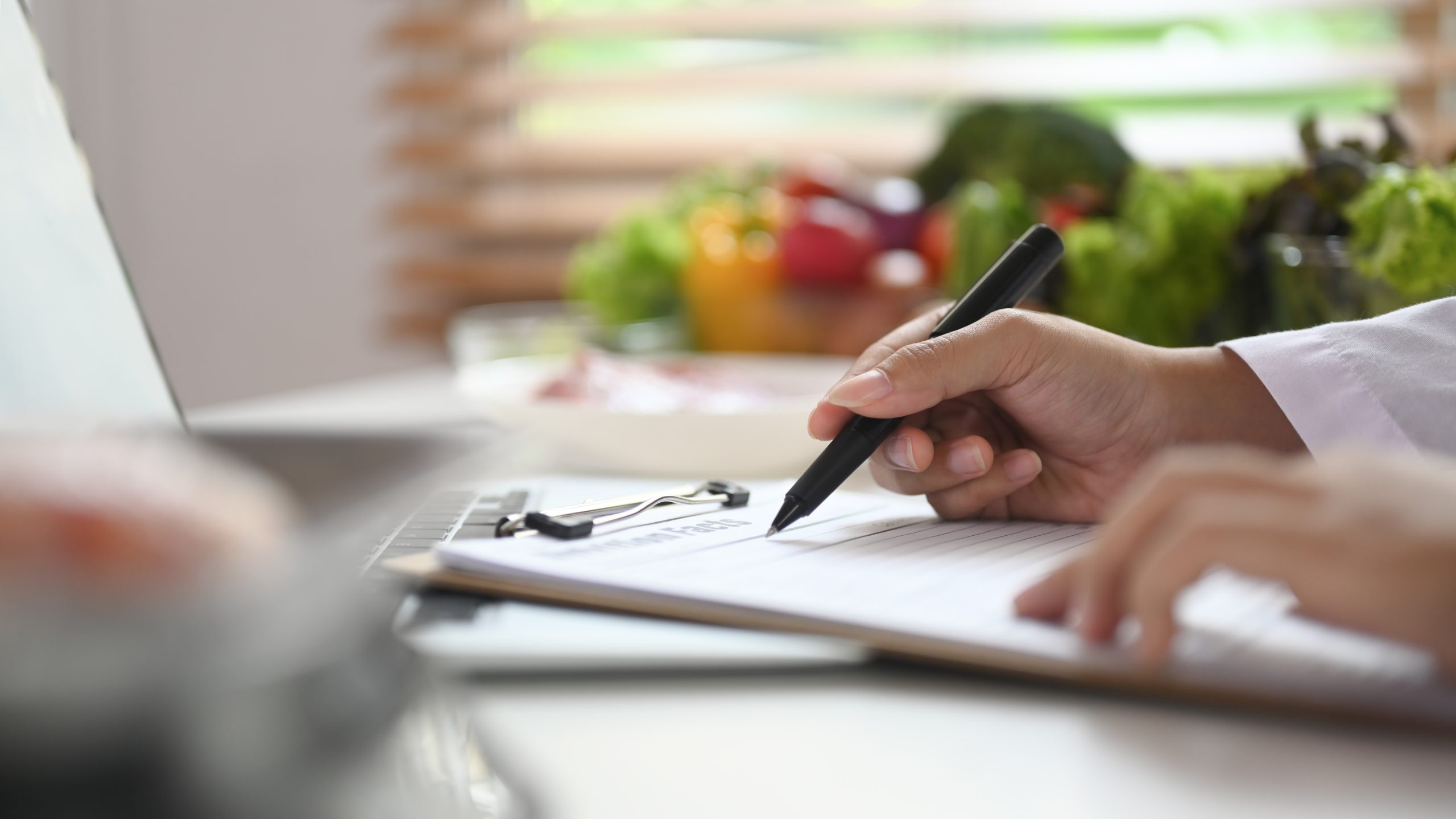 Dietitian providing personalised nutrition consultation and dietary planning